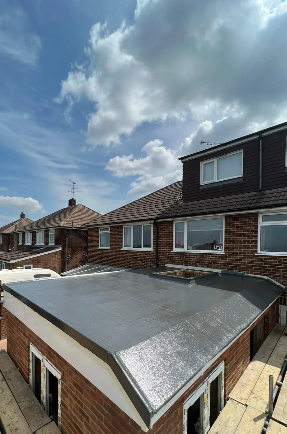New flat roof on the rear extension of a semi-detached house